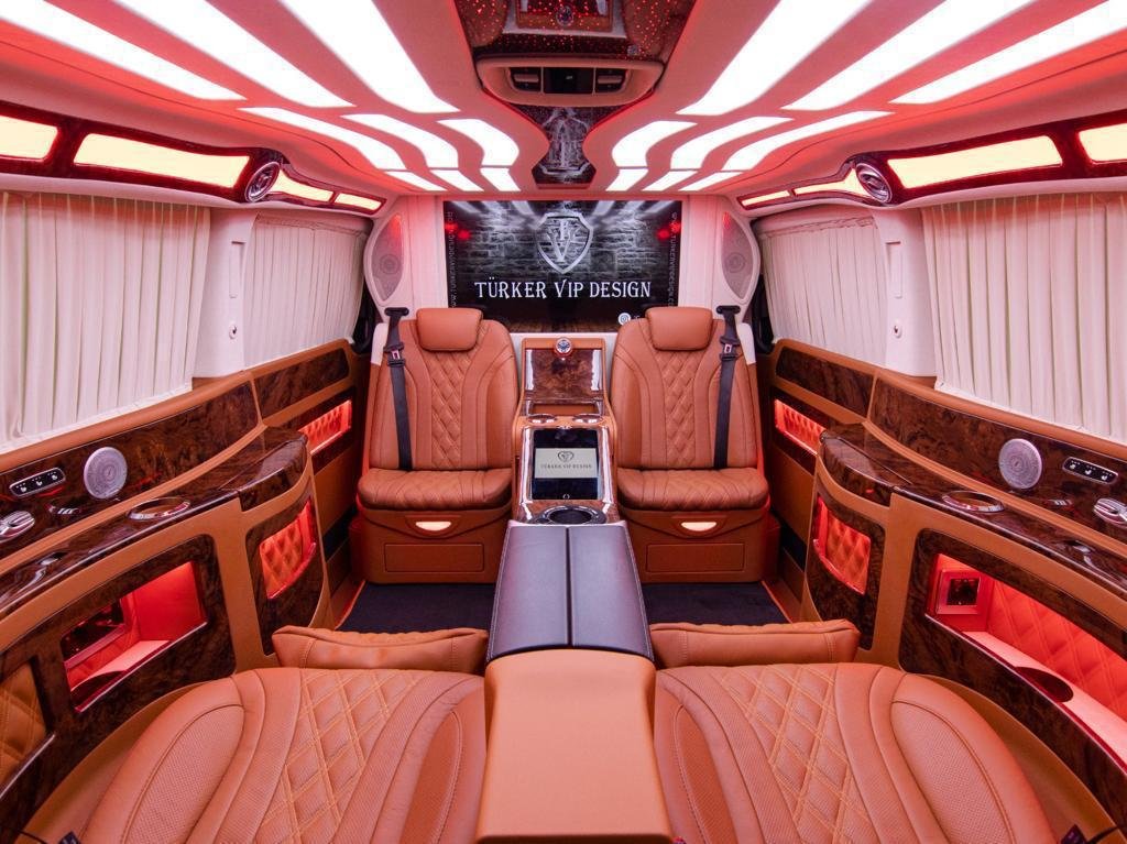 Airport transfer in Paris with luxury vehicle outside Charles de Gaulle Airport.